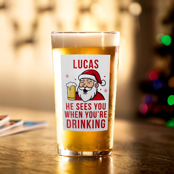 Personalised He Sees You When You’re Drinking Christmas Beer Glass
