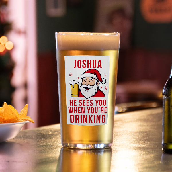 Personalised He Sees You When You’re Drinking Christmas Beer Glass