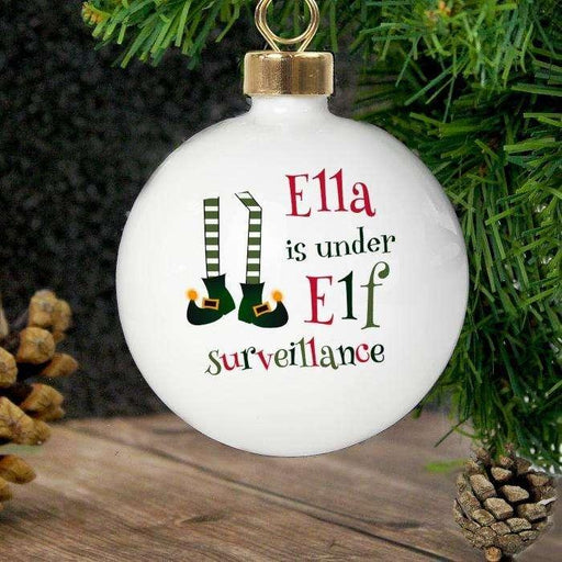 Personalised Under Elf Surveillance Christmas Bauble - Myhappymoments.co.uk