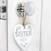 Personalised Sister Floral Wooden Hanging Heart Decoration From Pukkagifts.uk
