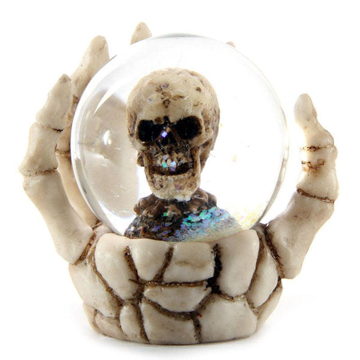 Skull Waterball Snow Globe in Skeleton Hand