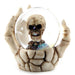 Skull Waterball Snow Globe in Skeleton Hand