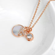 Rose Gold Initial Necklace with Mother of Pearl and Crystal Charms